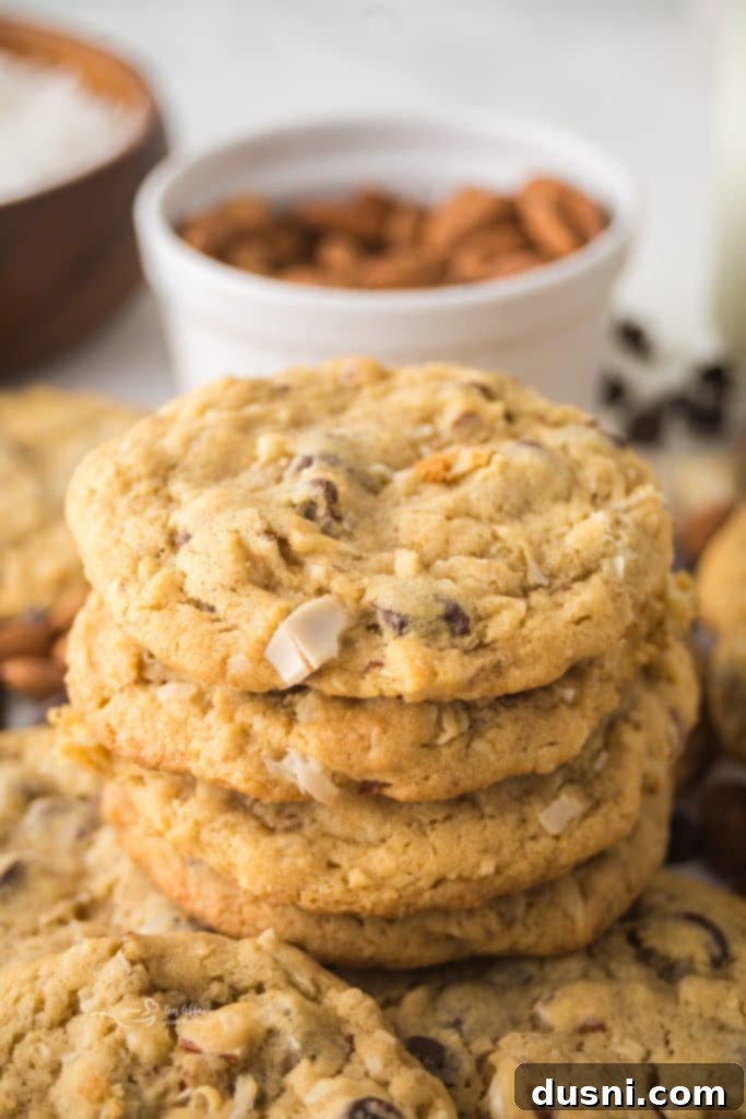 Freshly baked Almond Joy Cookies with chocolate chips and coconut flakes
