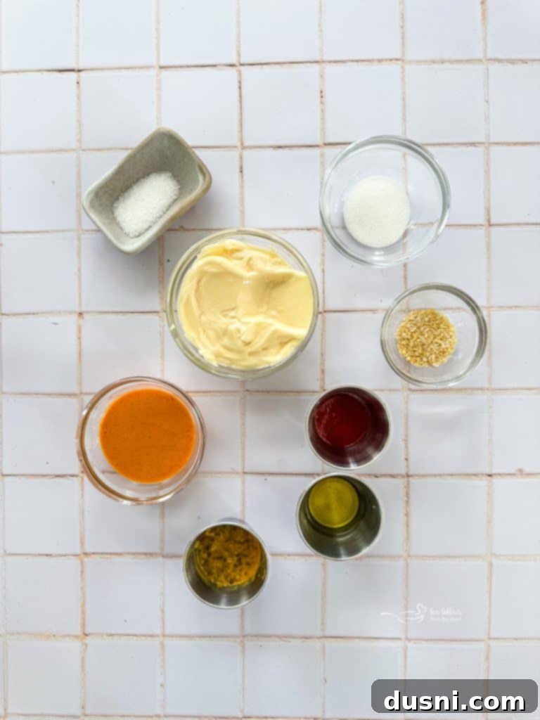Ingredients for Big Mac Salad sauce laid out on a table.