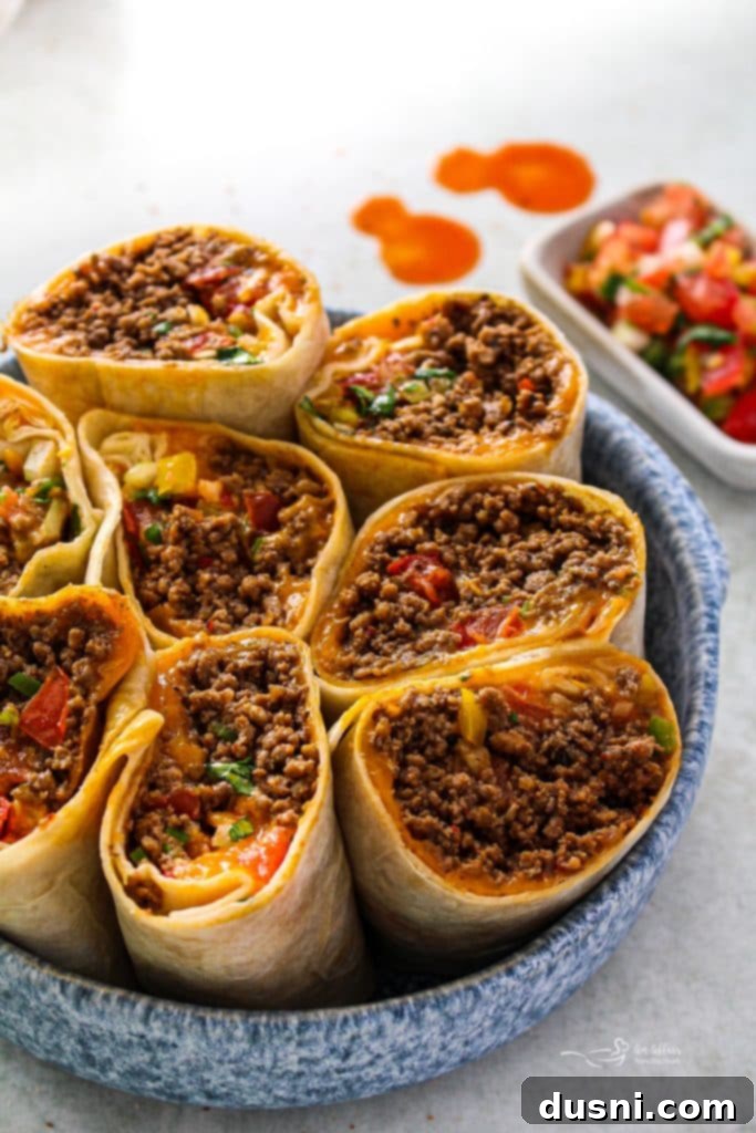 Stacked homemade Meximelts with pico de gallo on the side.