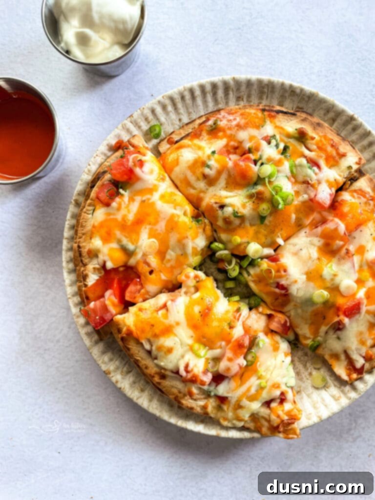 Taco Bell Mexican Pizza on tan colored plate