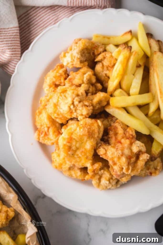 Hot Honey Glazed Crispy Popcorn Chicken 3 Hot Honey Popcorn Chicken served with dipping sauce