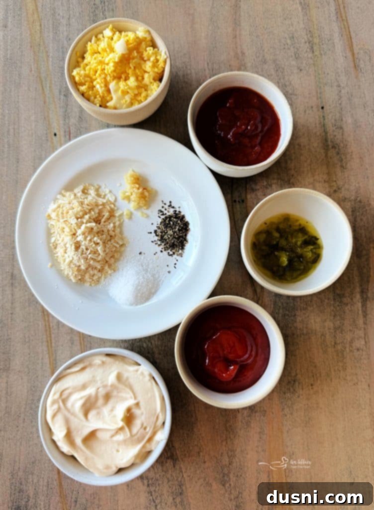 Ingredients for Homemade Thousand Island Dressing in separate small bowls.