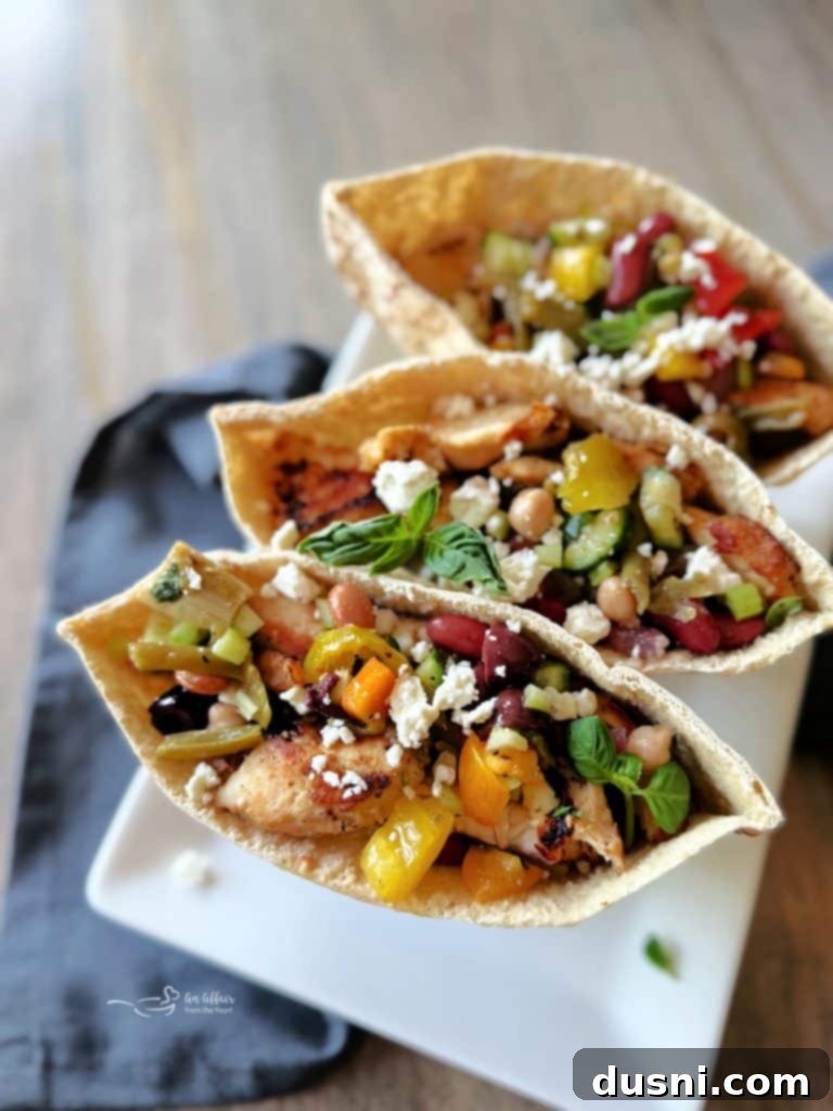 Close-up of Mediterranean Pickled Vegetable Salad with a fork