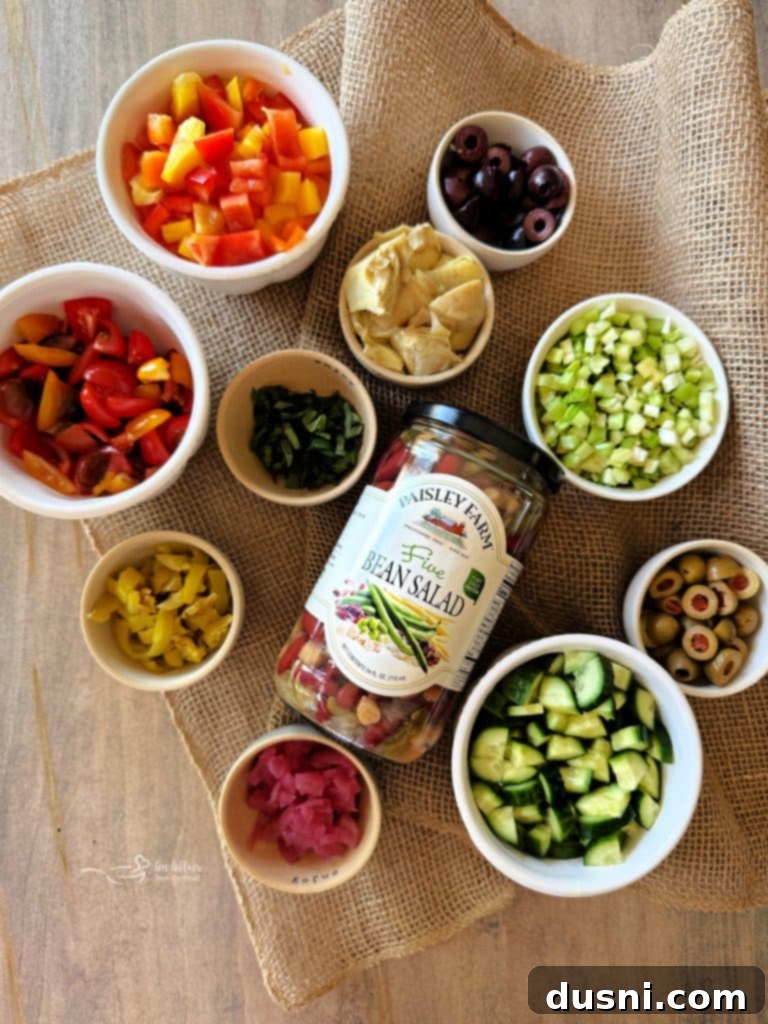 Freshly made Mediterranean Pickled Vegetable Salad in a bowl with a serving spoon