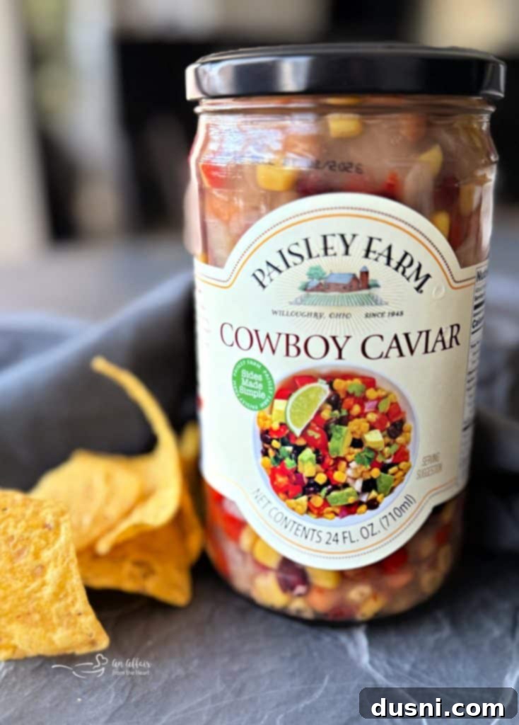 Mexican Street Burgers 5 A jar of Paisley Farm Cowboy Caviar next to fresh ingredients.