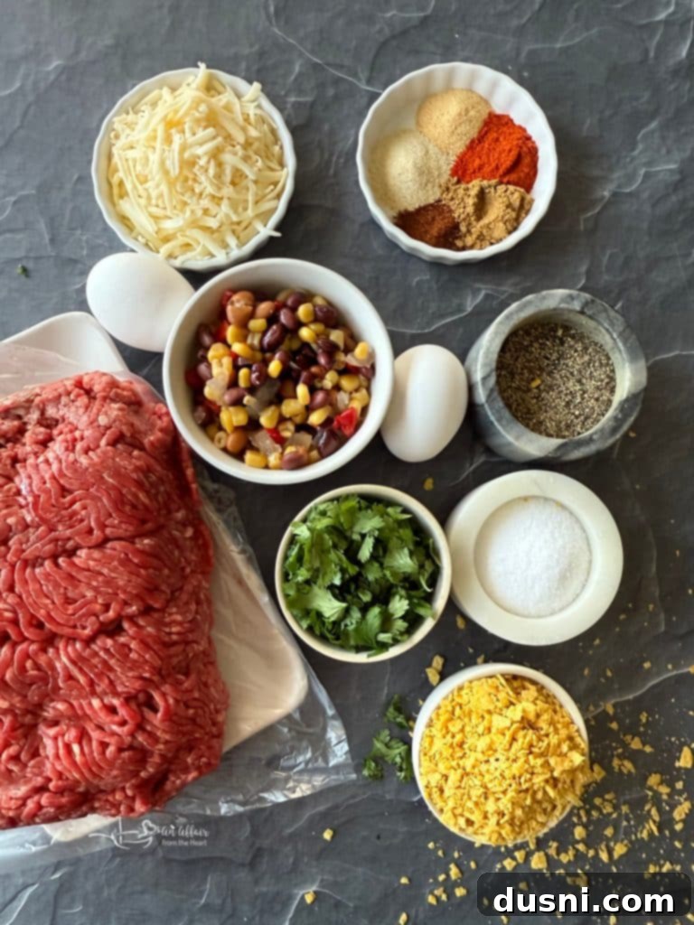 Mexican Street Burgers 7 Ingredients for Mexican hamburgers laid out on a table.