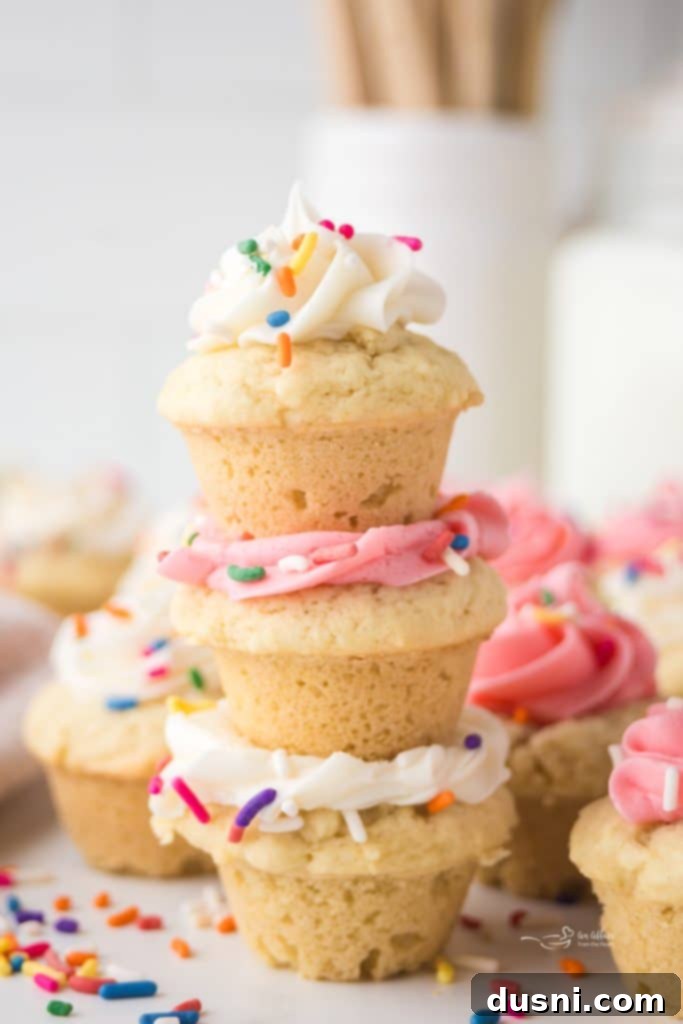 Delicious Frosted Sugar Cookie Cups 11 Assorted sugar cookie cups on a wire rack.