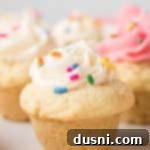 Delicious Frosted Sugar Cookie Cups 14 Close up of a white frosted Sugar Cookie cup.