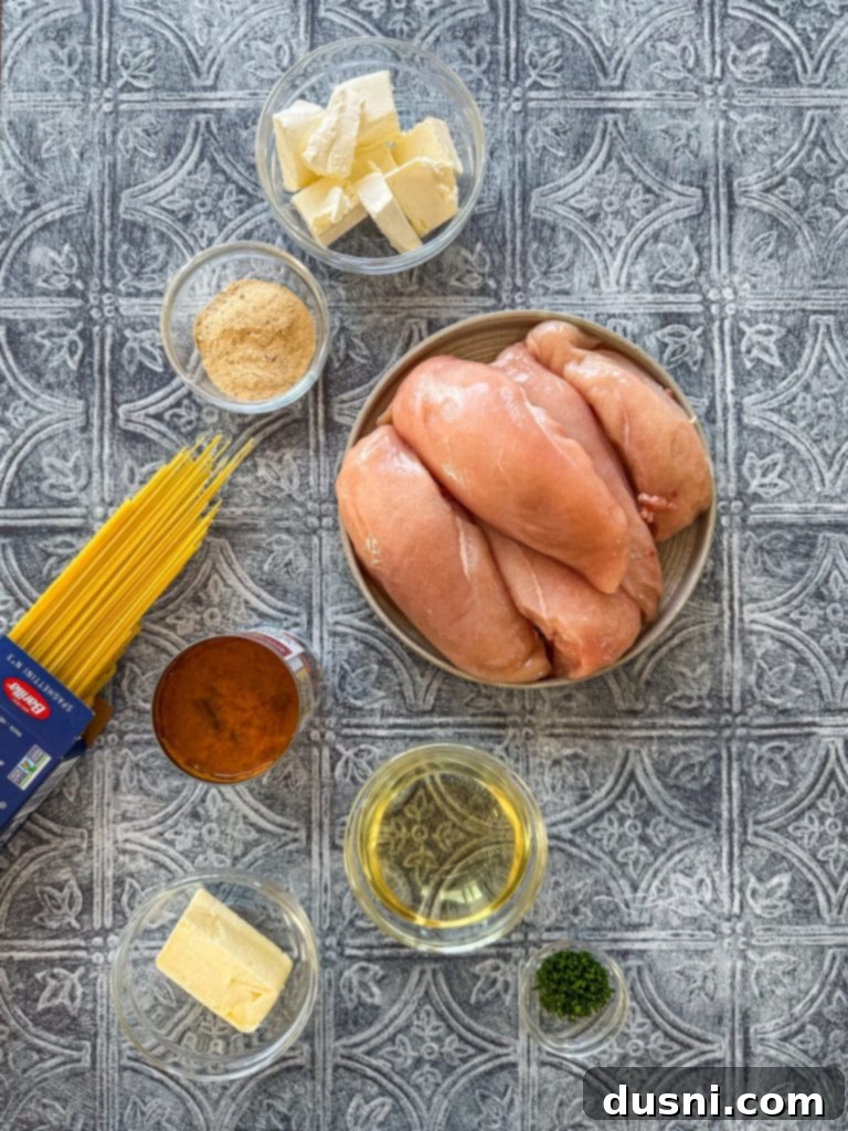 Overhead view of Slow Cooker Angel Chicken in the pot with creamy sauce.