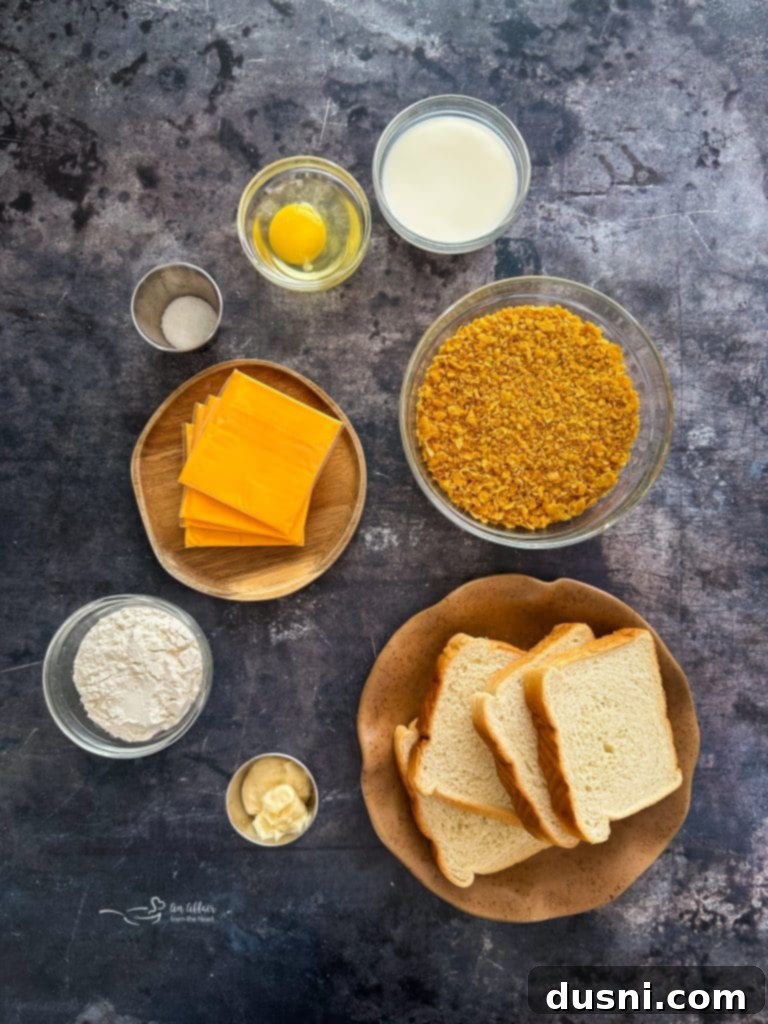 Crispy Cheesy French Toast 5 A freshly fried Cheese Frenchee cut in half, showcasing the melted American cheese inside.