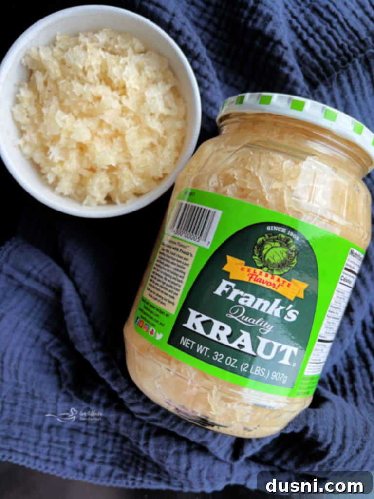 A jar of Frank's Kraut on a rustic wooden surface, highlighting the product.