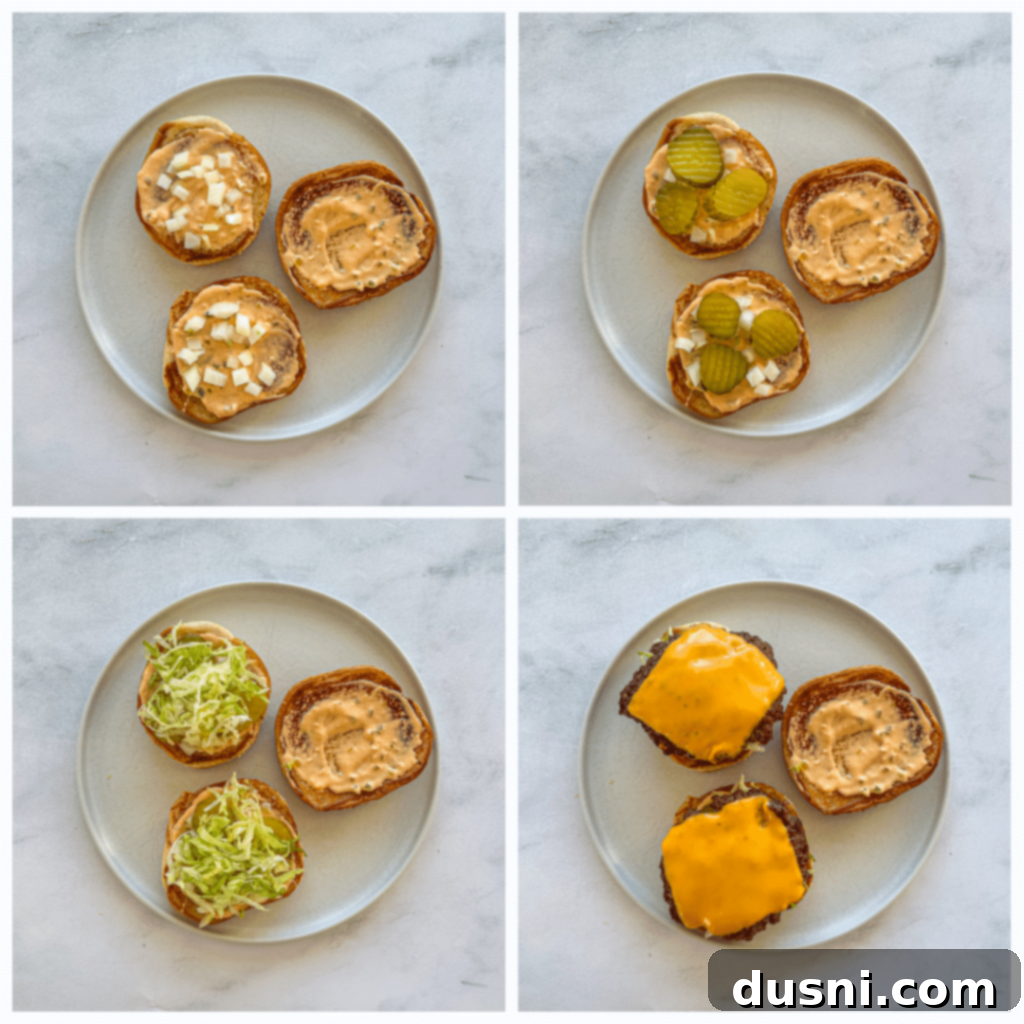 A beautifully assembled homemade Big Mac, showcasing all its layers.