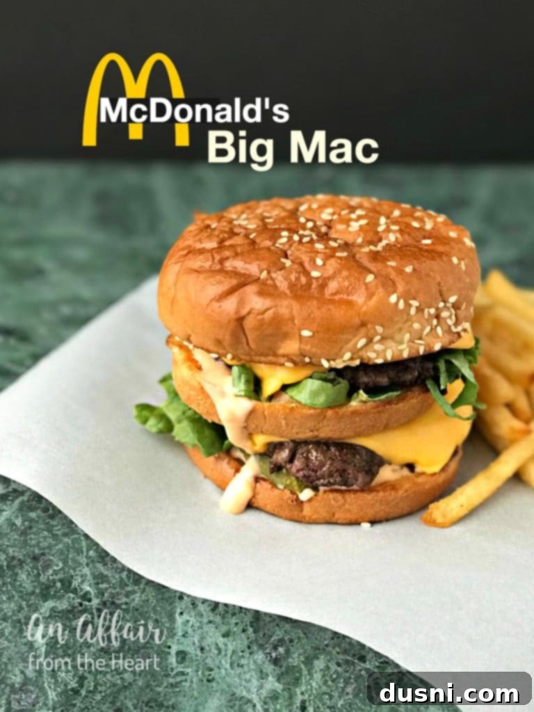 Copy Cat McDonald's Big Mac side view on parchment paper, showing the triple bun and generous fillings.