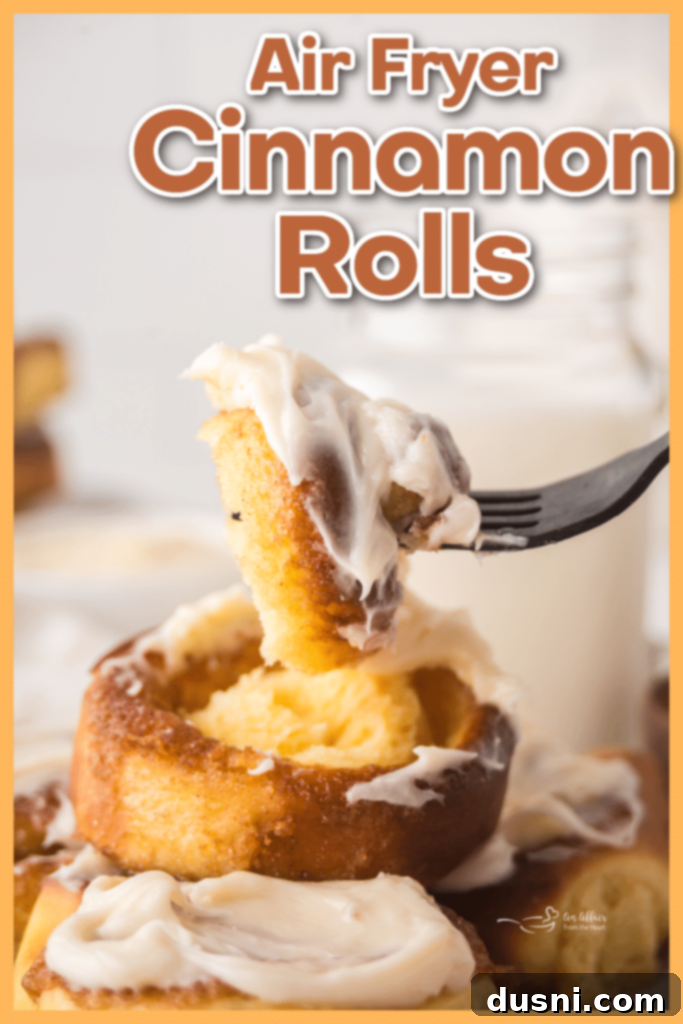 Air Fryer Cinnamon Roll Perfection 11 A close-up of a single air fryer cinnamon roll, showing the fluffy texture.