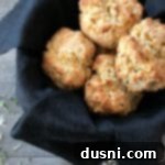 Overhead shot of freshly baked Cheesy Cornbread Drop Biscuits