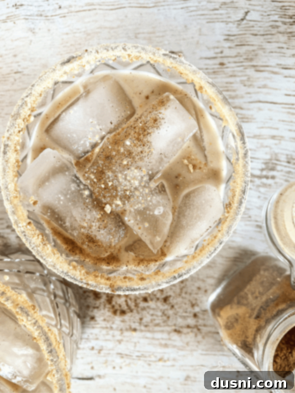 Velvet Almond Blush 15 overhead, close up of pumpkin white russian cocktail with ice in it.