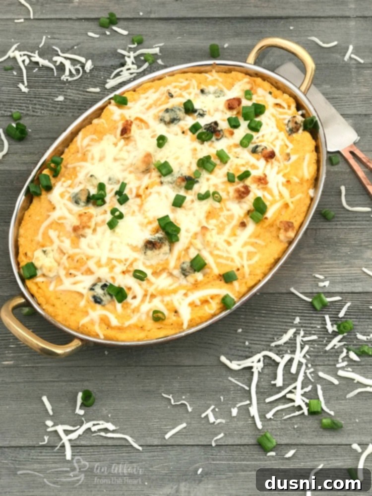 Spicy Buffalo Cauliflower Dip 11 Overhead shot of Buffalo Cauliflower Dip with various dippers