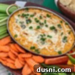 Spicy Buffalo Cauliflower Dip 14 Buffalo Cauliflower Dip surrounded by a variety of vegetables for dipping