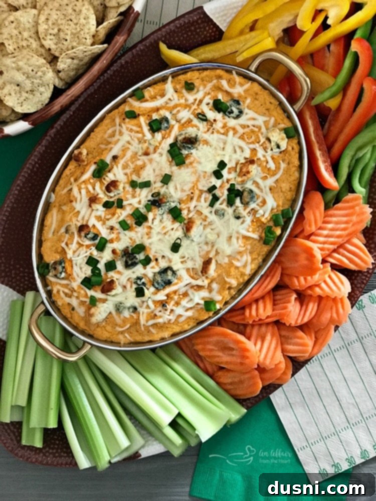 Spicy Buffalo Cauliflower Dip 5 Buffalo Cauliflower Dip served with celery and crackers