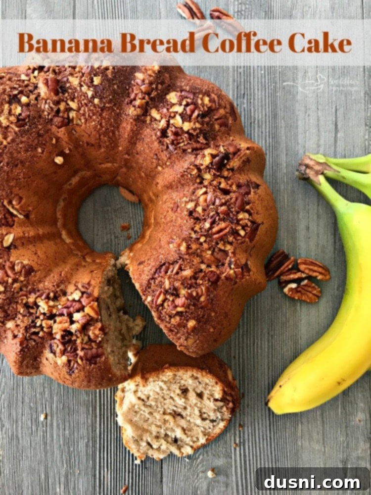 A beautifully sliced Banana Bread Coffee Cake ready to be served
