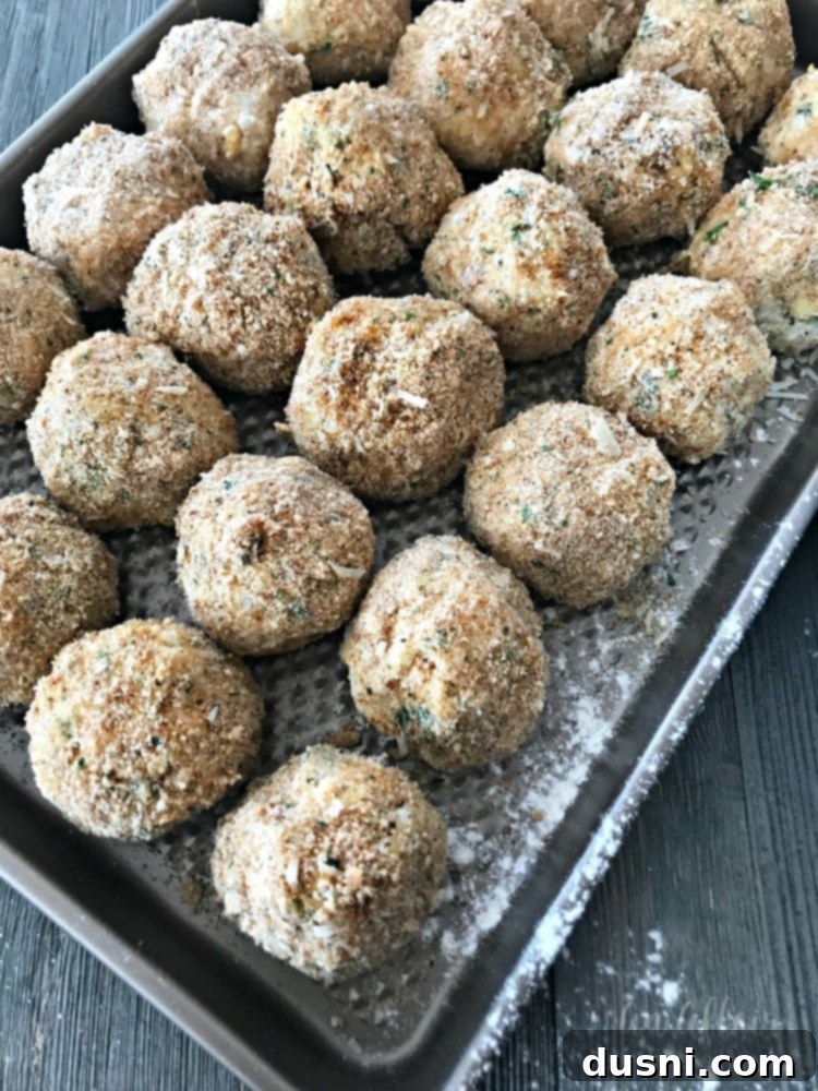 Breading Arancini: flour, egg wash, then breadcrumbs