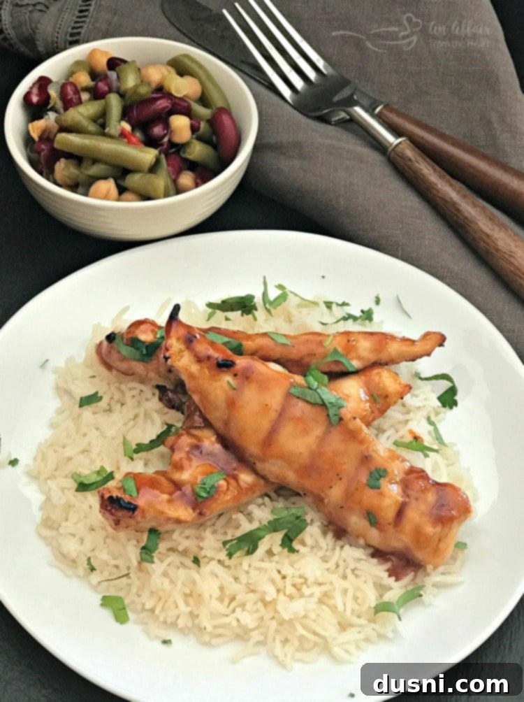 Sweet & Smoky Apricot BBQ Chicken 9 Delicious Apricot BBQ Glazed Chicken served with Basmati rice and cilantro