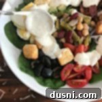 Loaded Spinach Salad with Creamy Roasted Garlic Dressing preparation steps