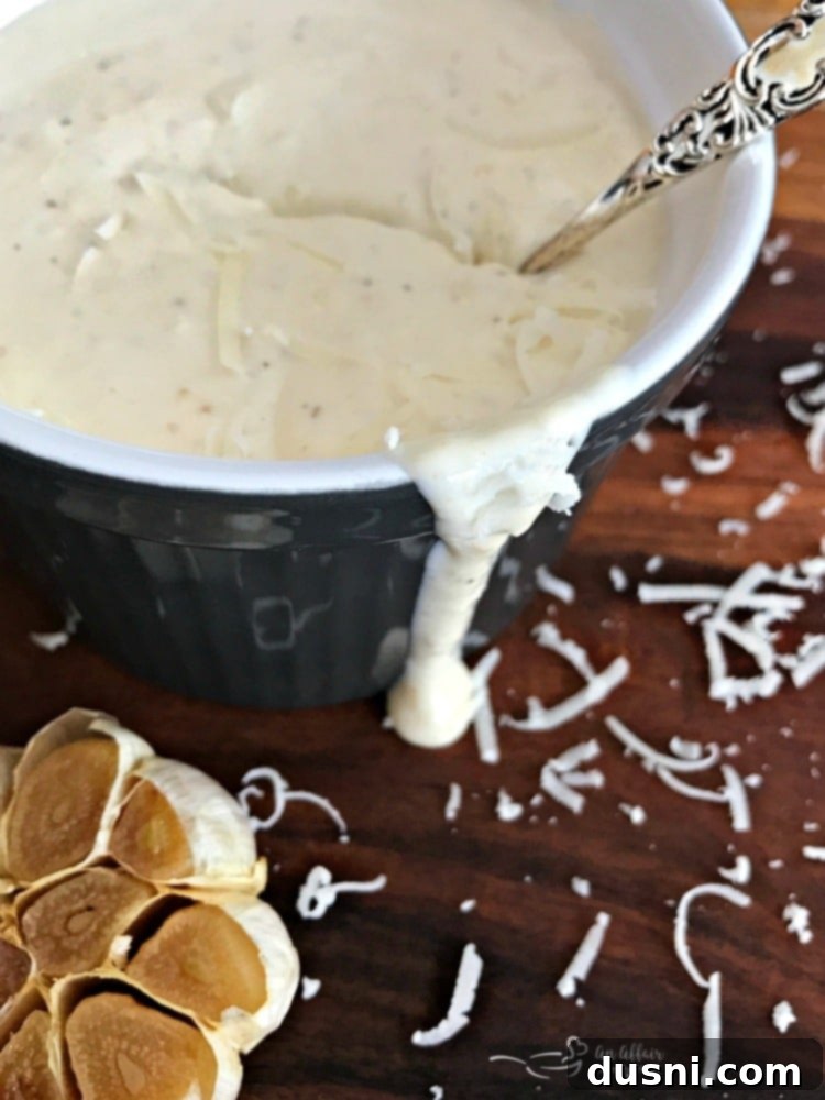 Close-up of the Creamy Roasted Garlic Dressing, highlighting its rich texture