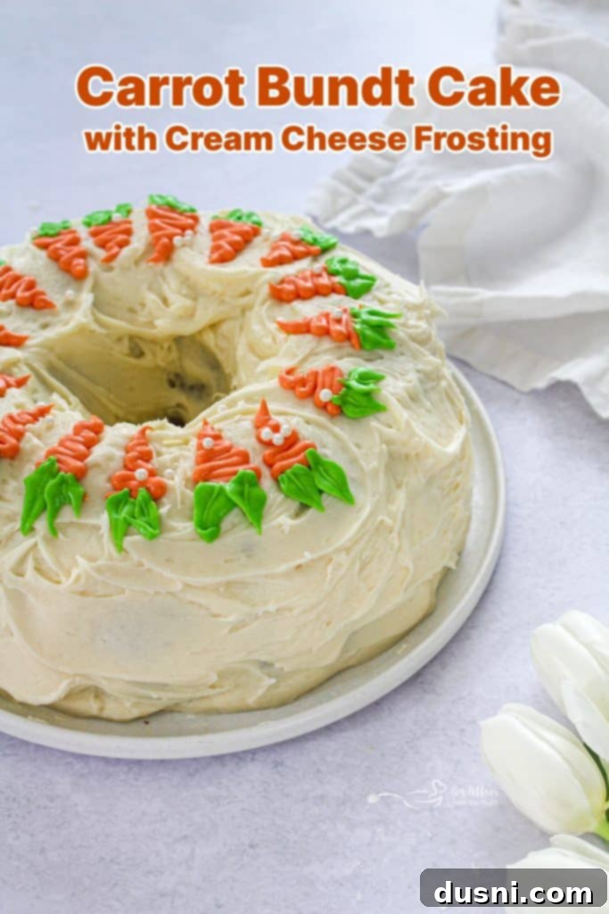 A close-up shot of the top of a Carrot Bundt Cake with cream cheese frosting.