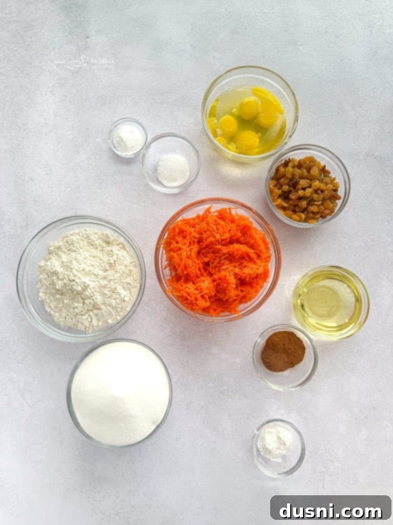 A close-up shot of a slice of carrot cake, showcasing its moist texture and grated carrots.