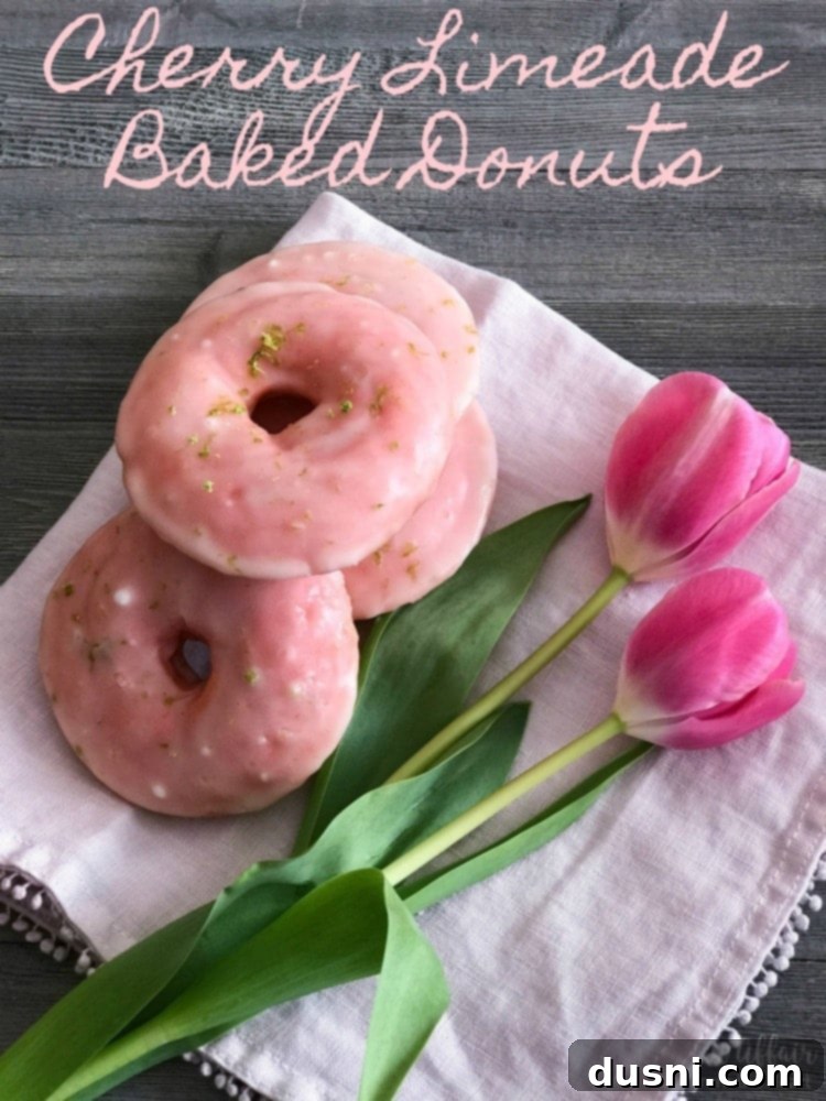 Hero shot of Cherry Limeade Baked Donuts beautifully arranged on a white serving platter