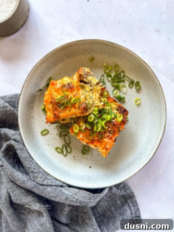 Sausage and Crescent Breakfast Casserole sliced on a serving plate