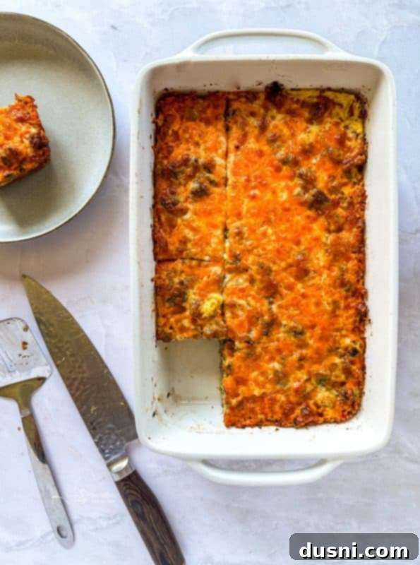 Baked sausage crescent breakfast casserole with melted cheese