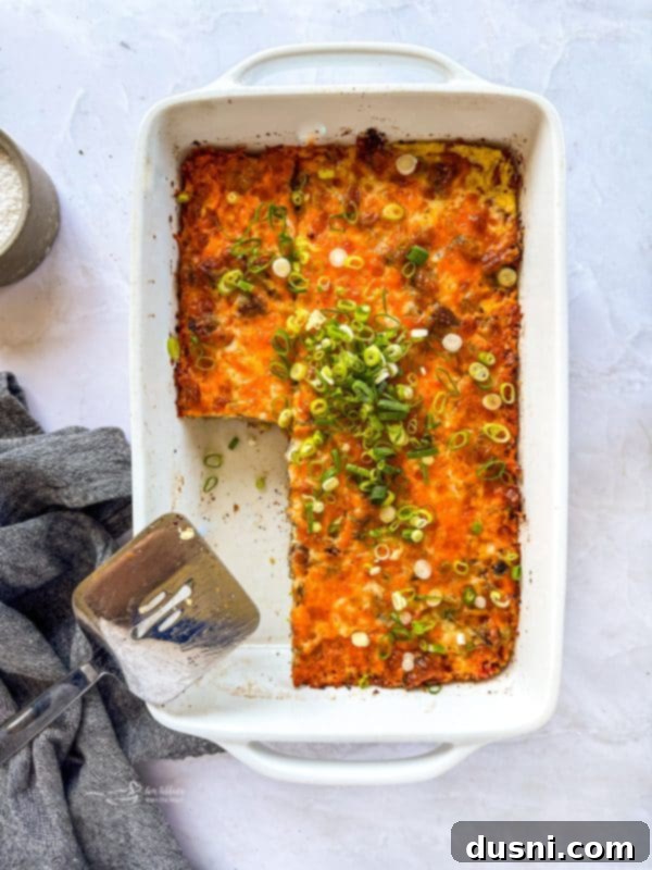 Sausage crescent breakfast casserole garnished with scallions