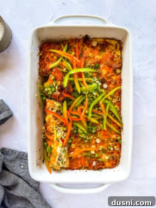 Close-up of baked sausage crescent breakfast casserole with melted cheese