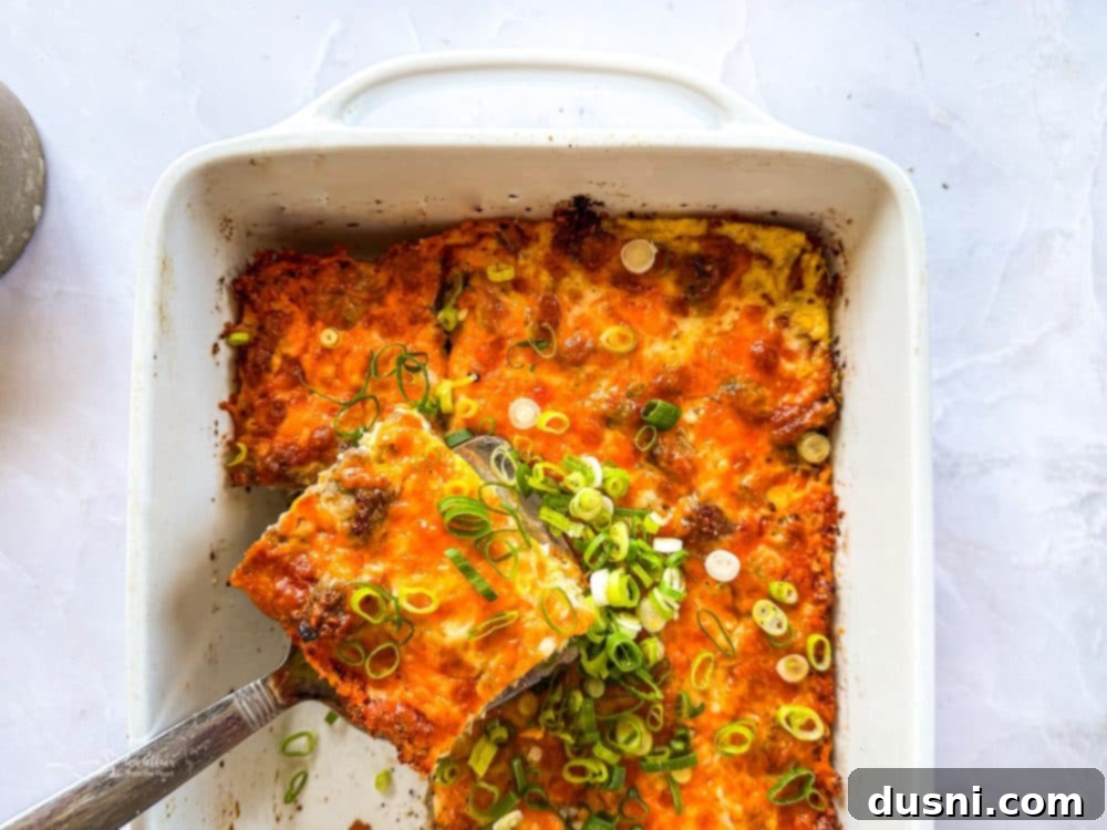 Sausage crescent breakfast casserole baking in a dish