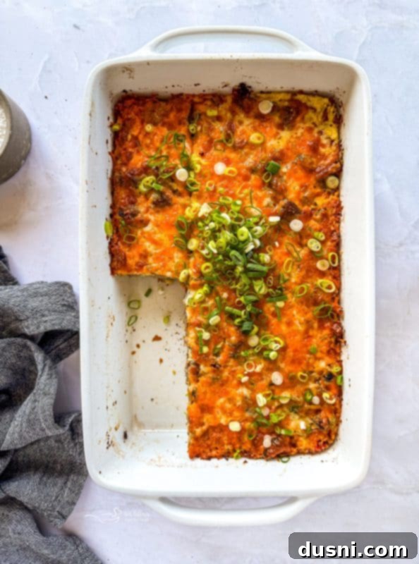 Sausage and vegetables browned in a skillet for the breakfast casserole
