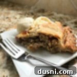 Grandma's Rhubarb Pie on a white plate with a fork