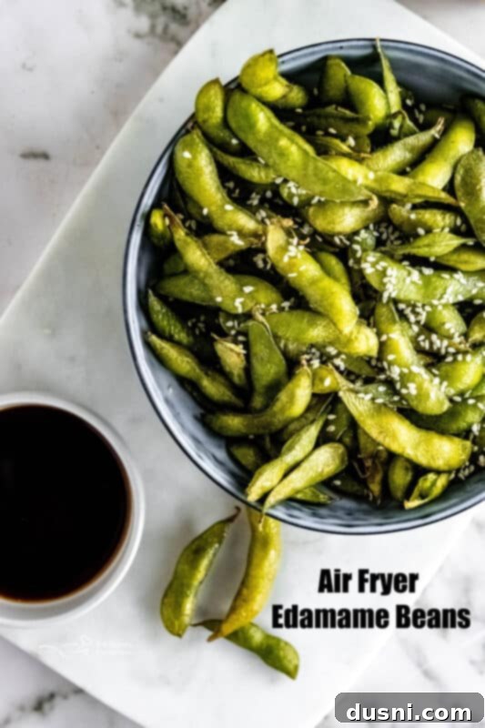 A large bowl of air fryer edamame beans, ready to serve