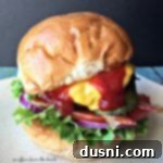 The Ultimate Guide to Perfect Burgers 12 The Best Burger close up on a white plate