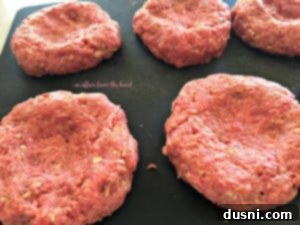 The Ultimate Guide to Perfect Burgers 4 Raw burger patties with a thumbprint well