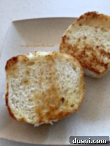 The Ultimate Guide to Perfect Burgers 5 Toasted burger buns in a skillet