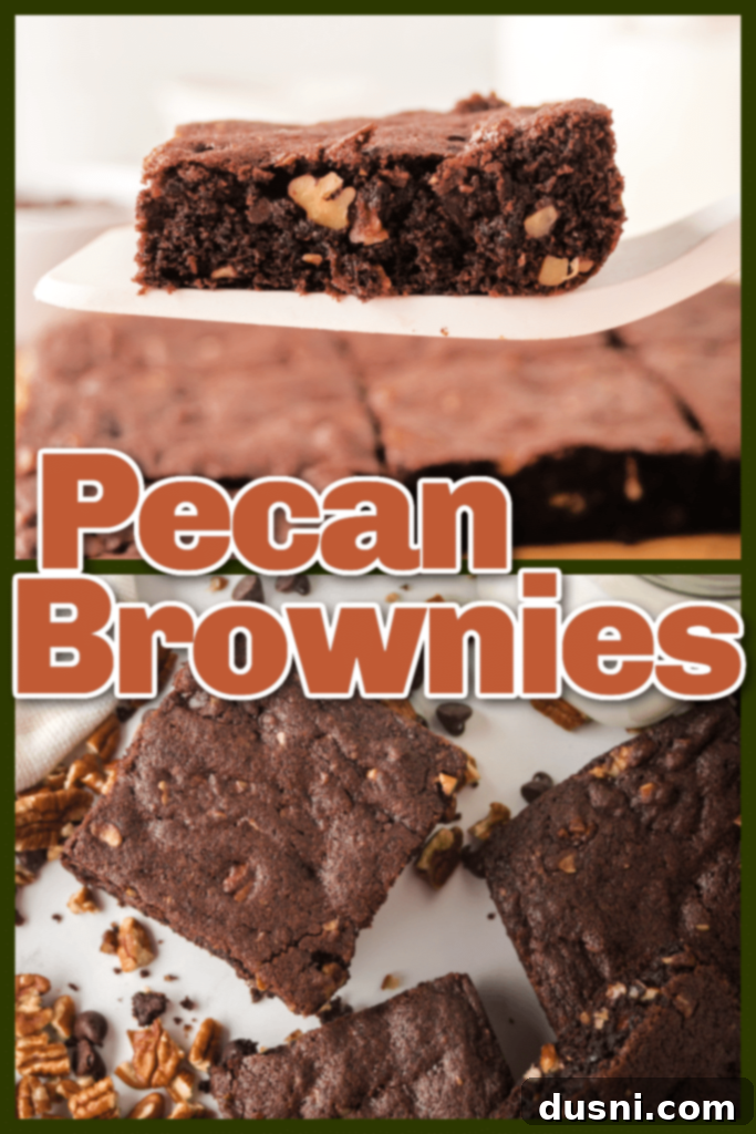 A beautifully sliced fudgy pecan brownie on a white surface, showing the dense interior.