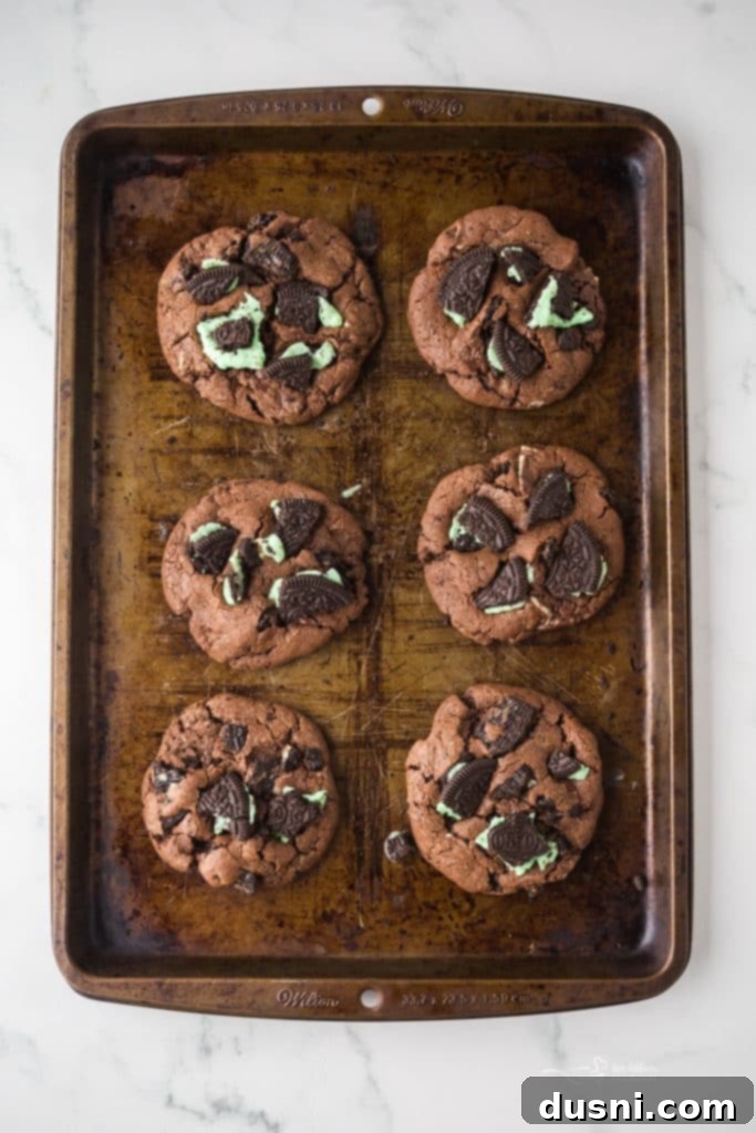Baked Chocolate Mint Oreo Cookies on a wire rack