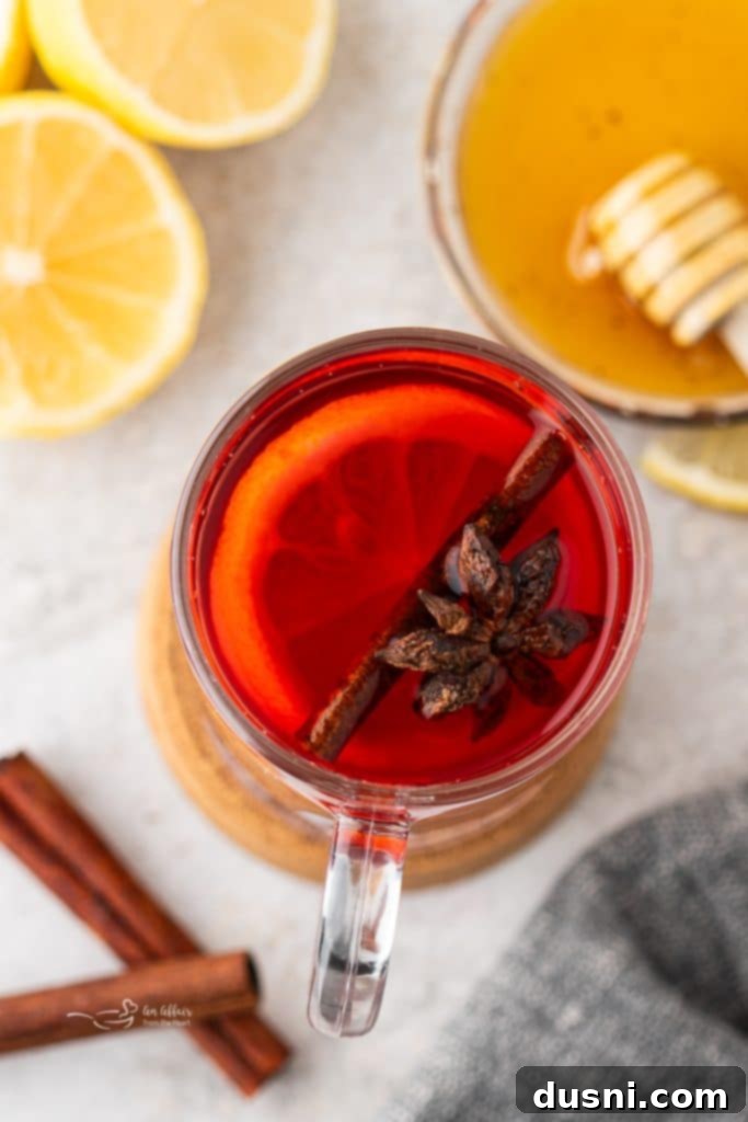 Raspberry Hot Toddy with cinnamon stick