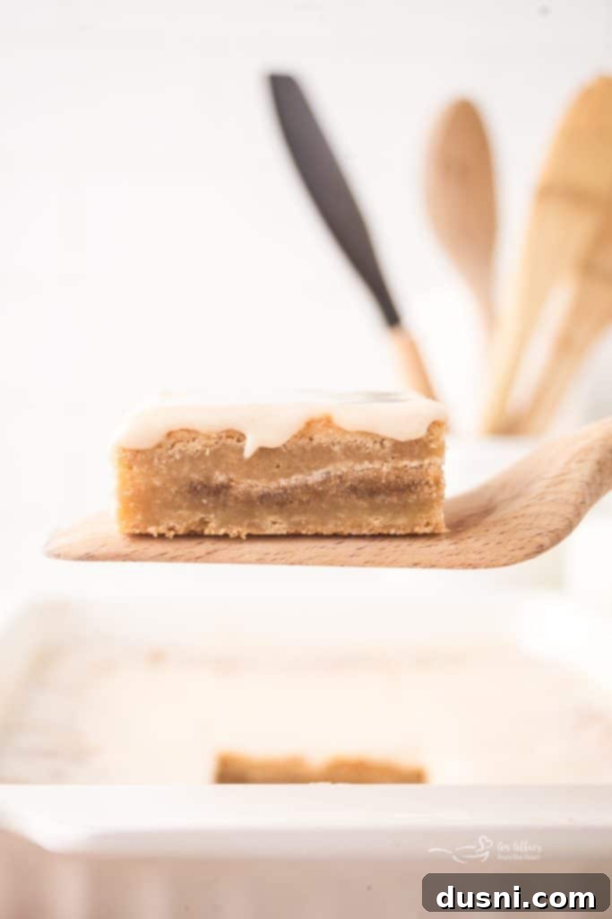 Brown Sugar Cinnamon Pop Tart Bars cooling on a wire rack
