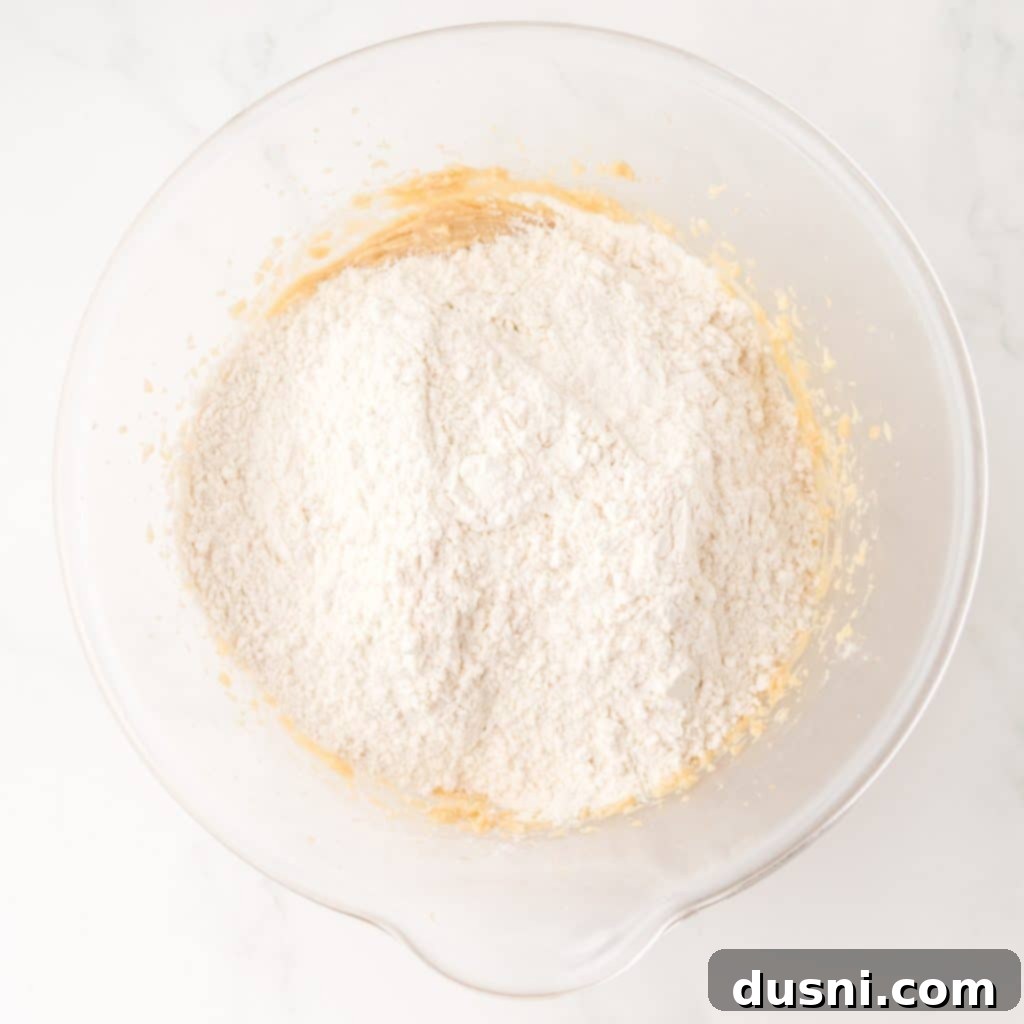 Mixing dry ingredients into the wet ingredients