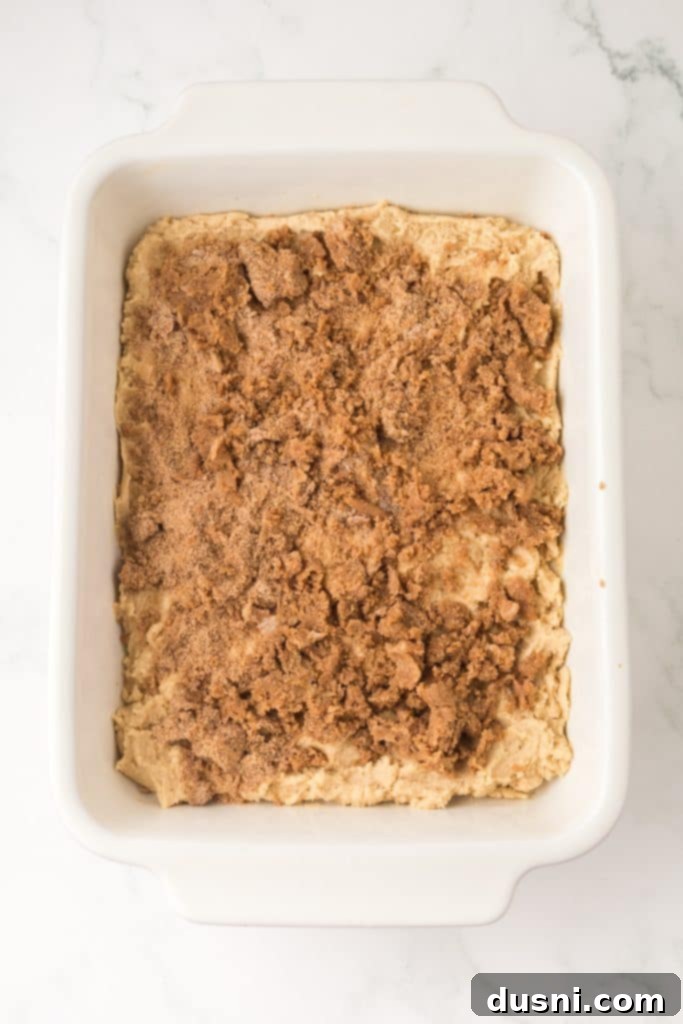 Pressing dough into a baking pan