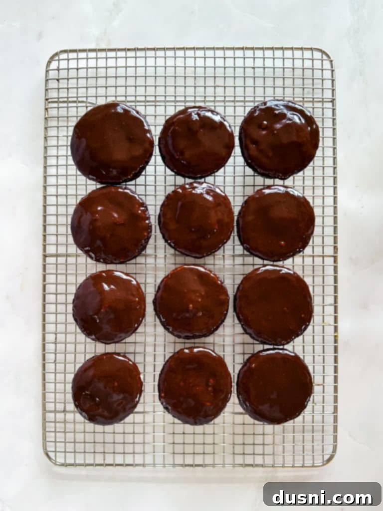 Homemade Hostess-Style Cupcakes 12 Pouring Ganache